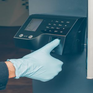 man-getting-intercom-read-his-fingerprint-open-door-with-gloves (1)